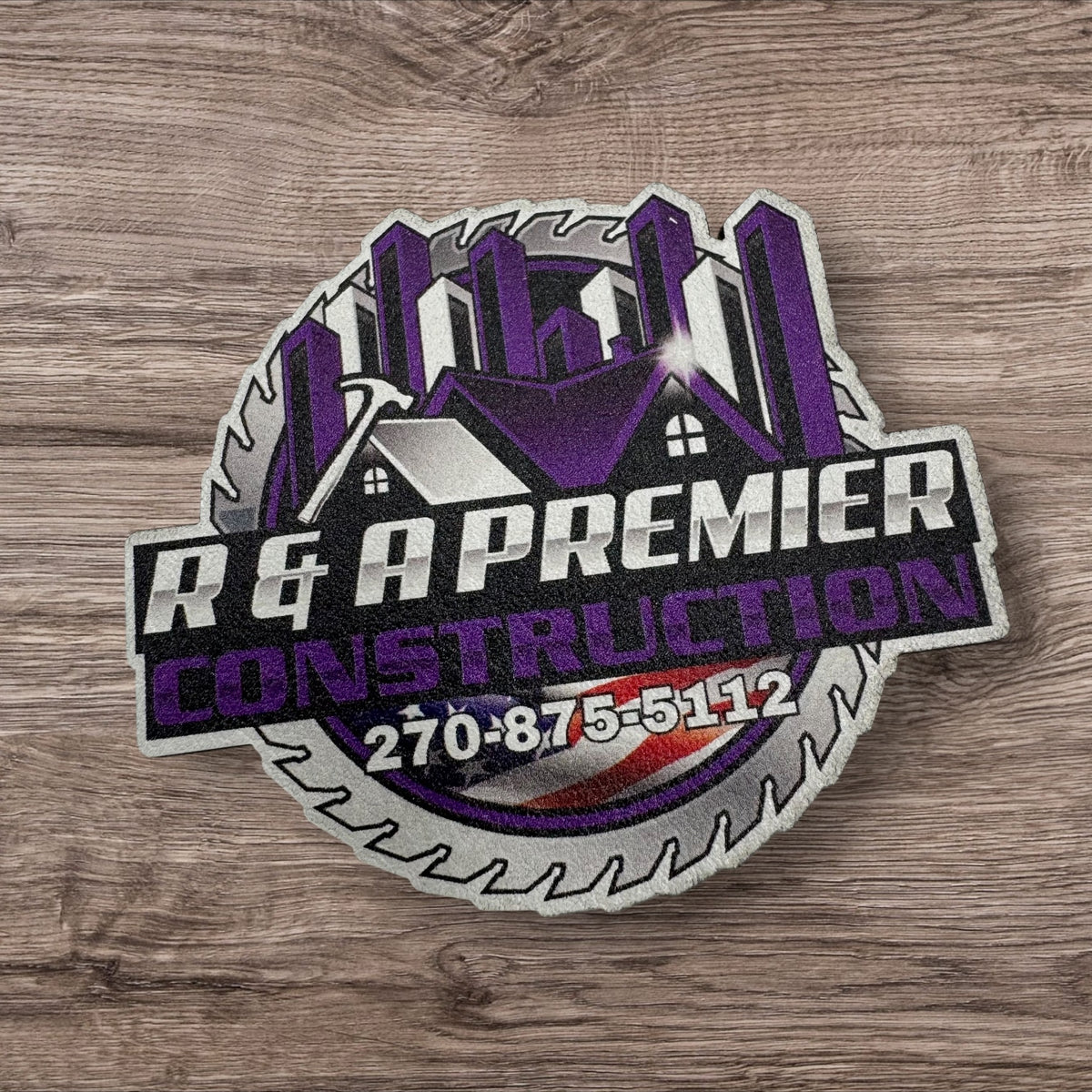 Custom-shaped purple, black and silver UV printed leatherette patch for R & A Premier Construction